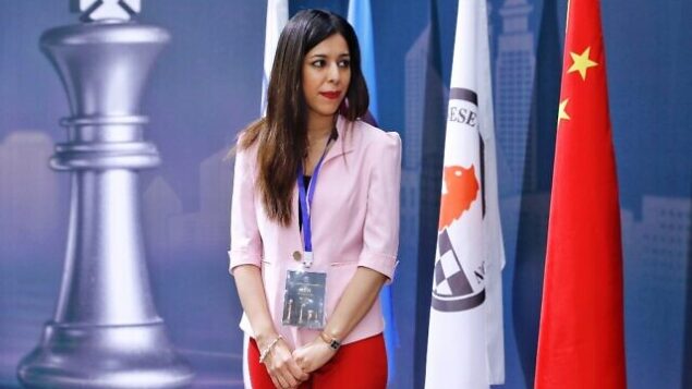 Shohreh Bayat, chief arbiter for the match between Aleksandra Goryachkina of Russia and Ju Wenjun of China, looks on before the match during the 2020 International Chess Federation (FIDE) Women's World Chess Championship in Shanghai on January 11, 2020. (Photo by STR / AFP) / China OUT / TO GO WITH AFP STORY BY PETER STEBBINGS